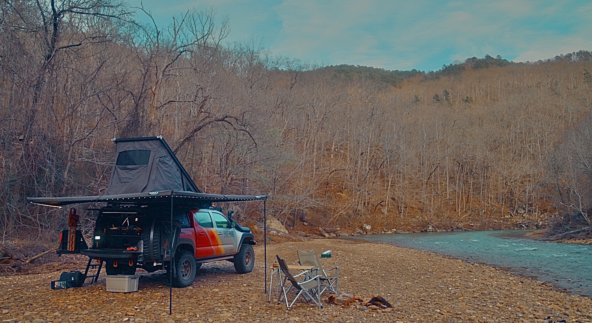 Fast Rack Overland camp beside a creek